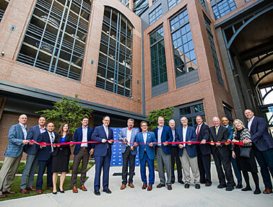 Members of H&P's leadership and Board of Directors cut the ribbon on their new HQ in downtown Tulsa, OK.